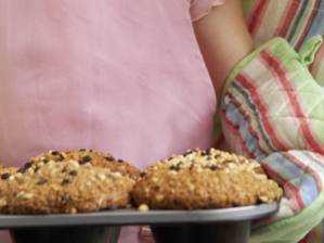 Mother and Daughter Baking Muffins